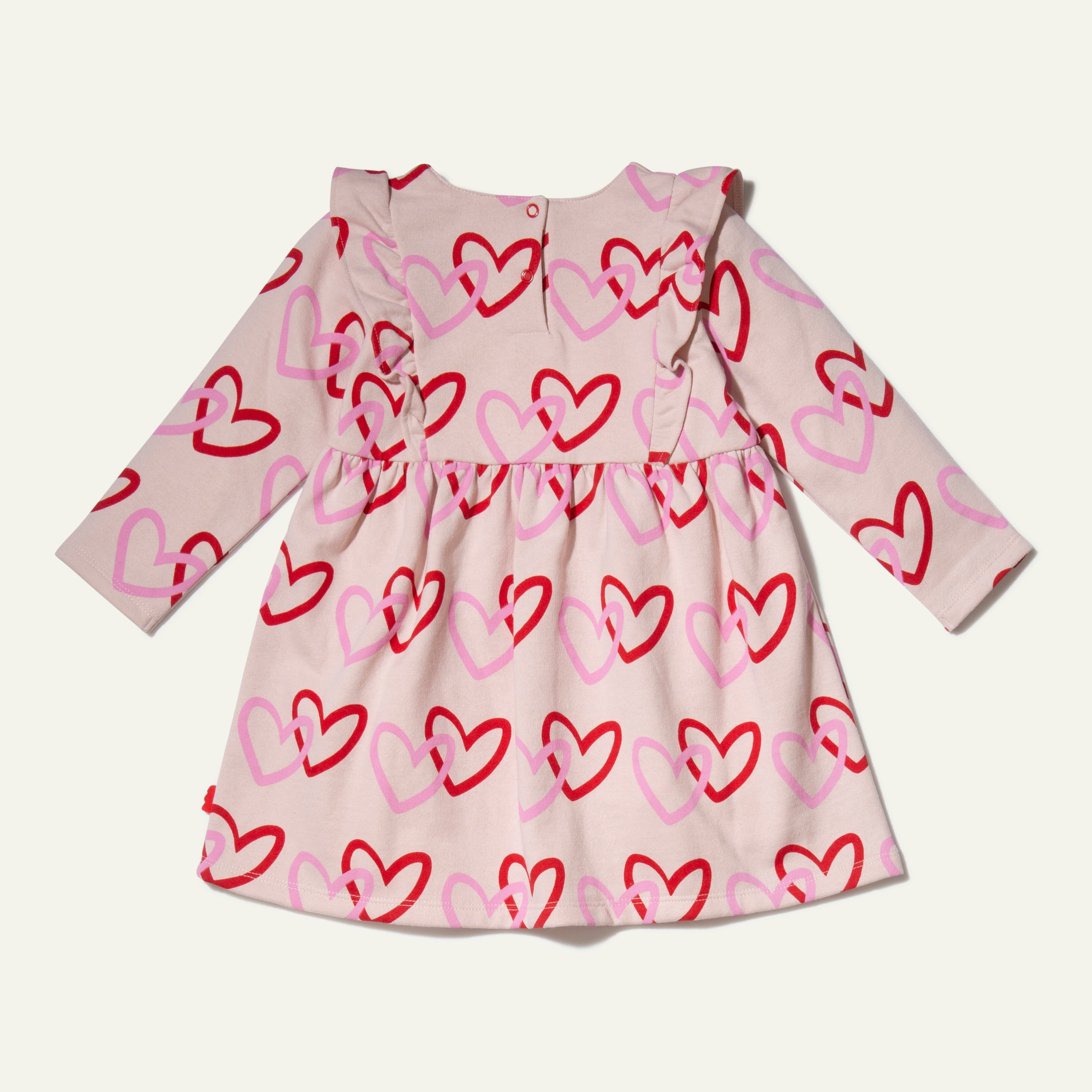 Mon Coeur recycled cotton baby ruffle dress with snap button back closure