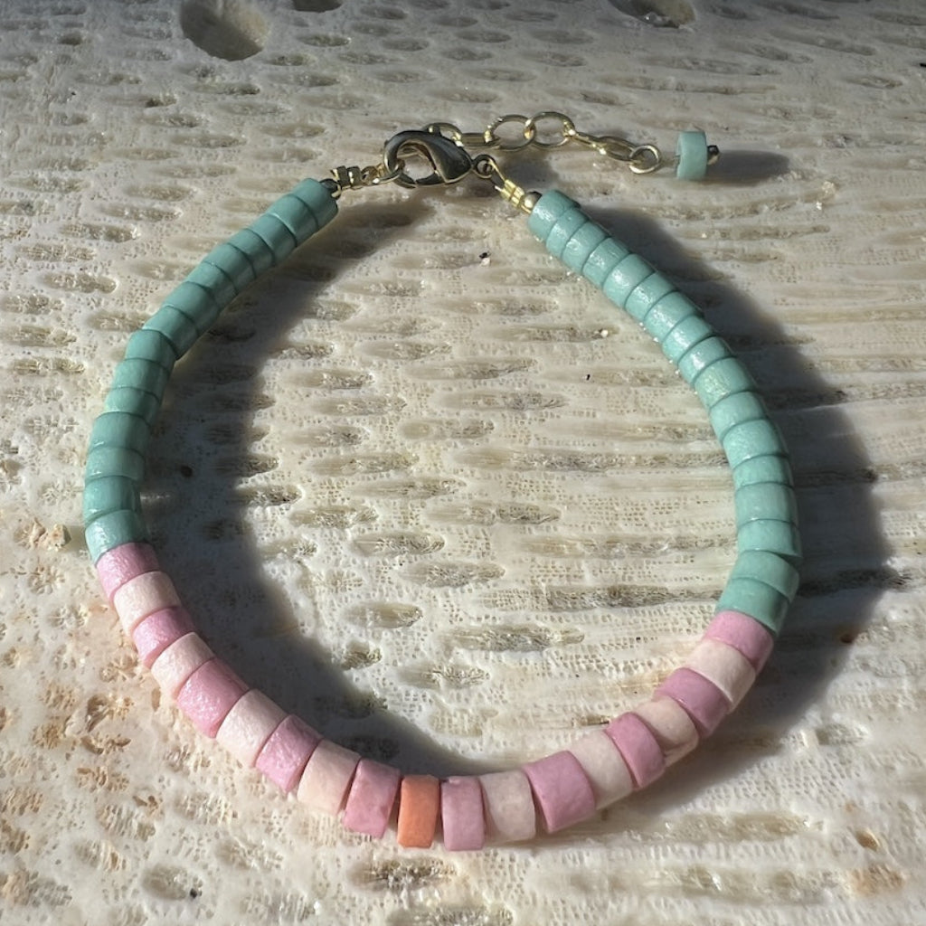 Heishi bone bracelet laid flat showcasing natural bone bead variations and Fair Trade craftsmanship from India