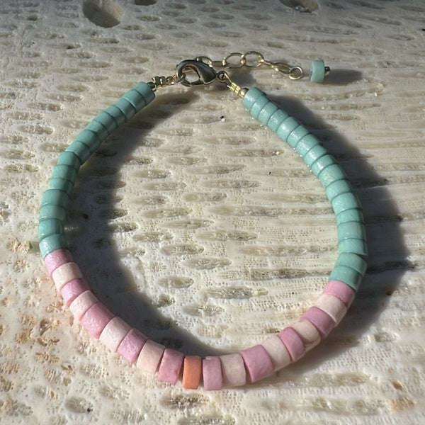Heishi bone bracelet laid flat showcasing natural bone bead variations and Fair Trade craftsmanship from India