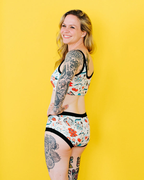 Side view of Thunderpants Inked Up women's hipster underwear showing fit and tattoo print detail