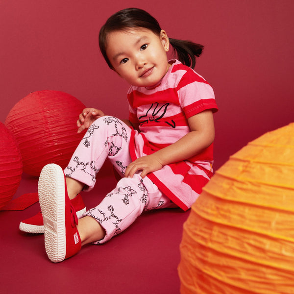 Baby wearing Mon Coeur Coco Harem Pant with poodle print, styled for fall and winter