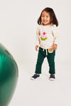 Mon Coeur sustainable baby long-sleeve t-shirt with flower print, styled outfit view