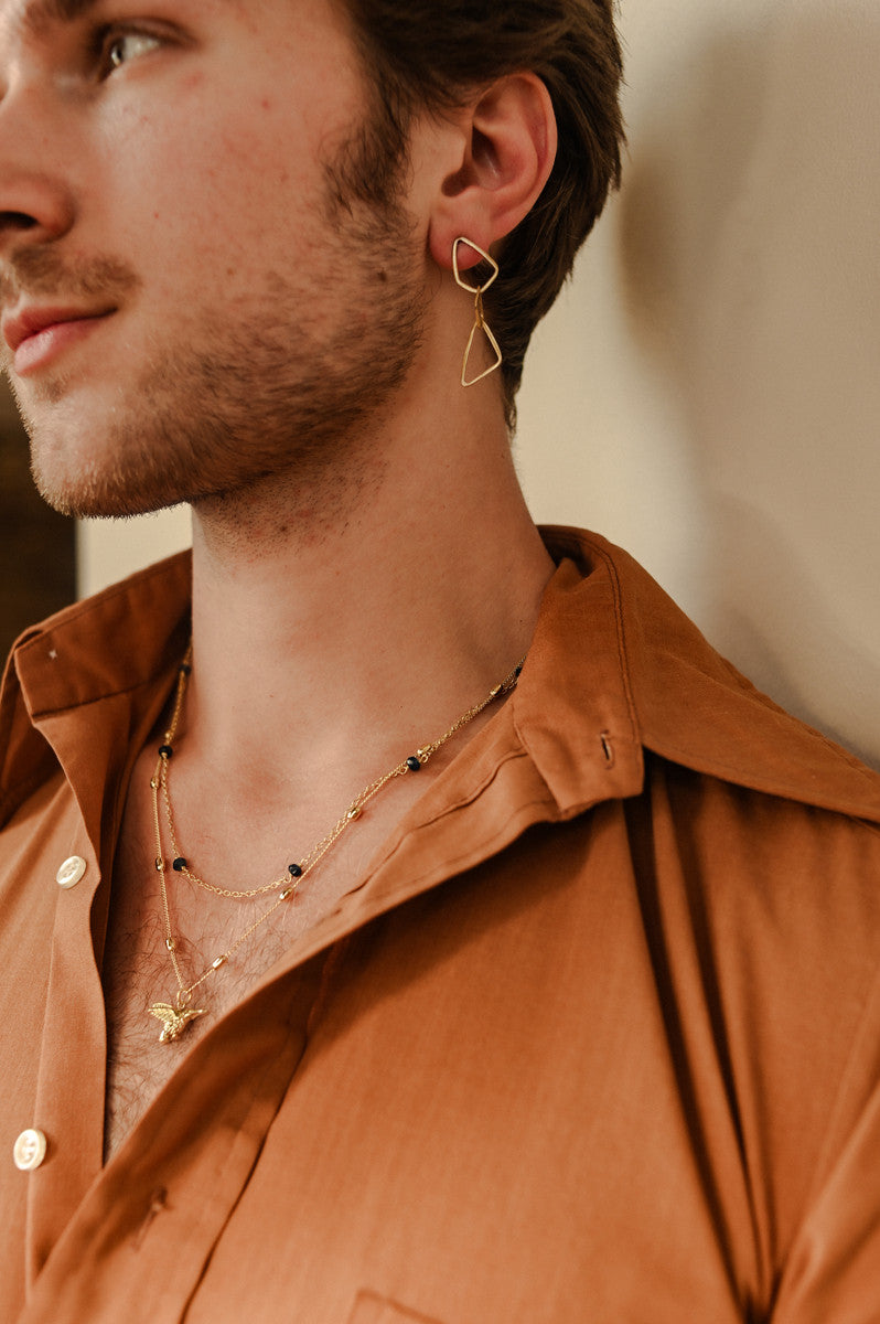 Geometric dangle brass earrings styled with a lapis convertible necklace — Fair Anita India Collection