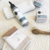 Heliotrope SF lemon and thyme face scrub styled with linen and natural skincare accessories