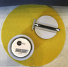 Lavender shave soap bar with shave brush on yellow surface — Heliotrope SF shaving soap