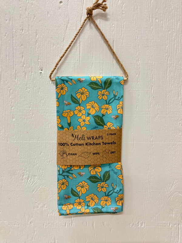 Puakenikeni & Bee Kitchen Towel Set of 2, 100% cotton, folded on a kitchen surface