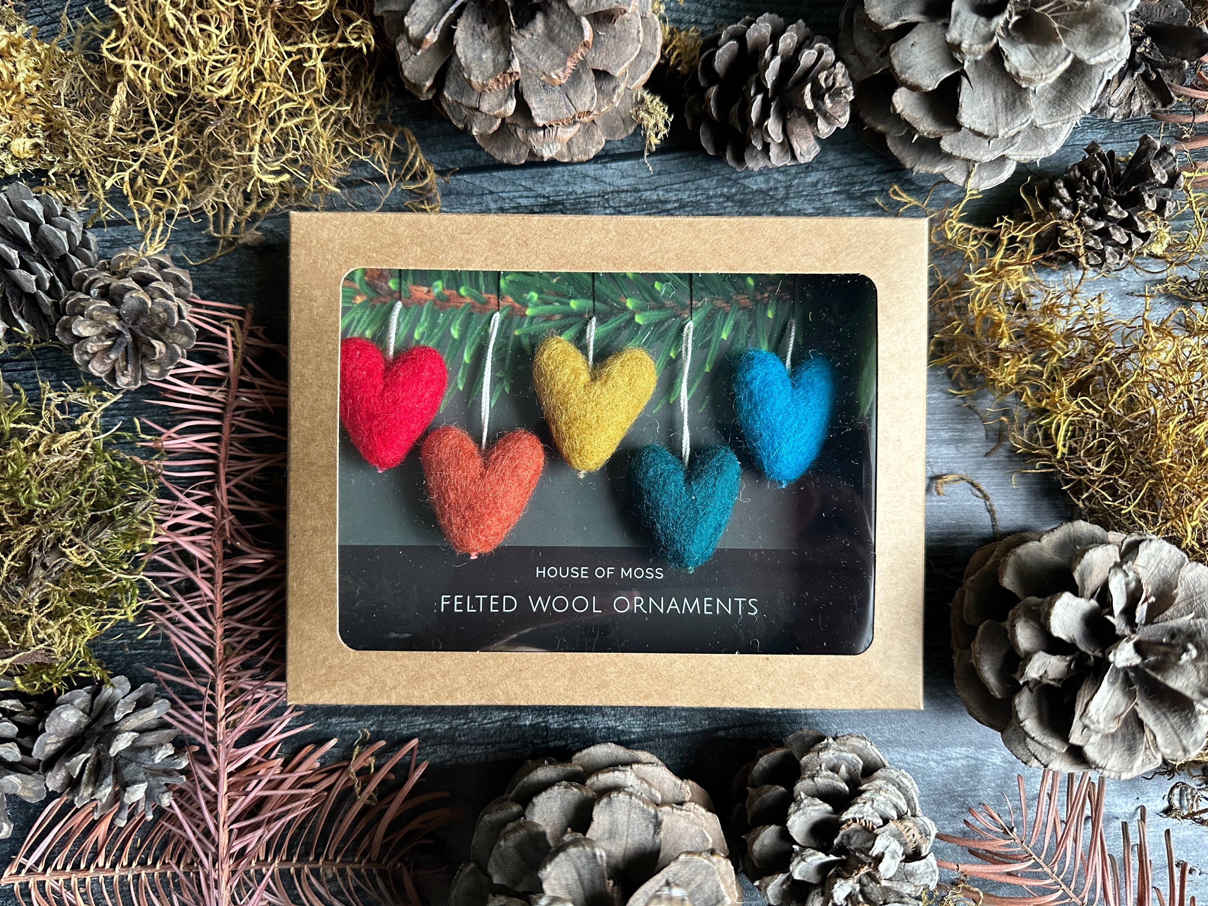 Small wool heart ornaments, about 1 inch across, for mini holiday trees