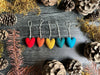 Set of five rainbow wool heart ornaments by House of Moss