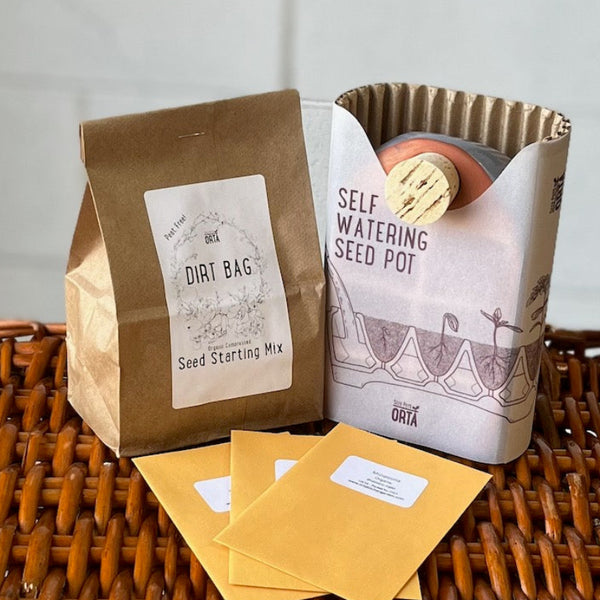 Orta Gardens Food Security Beginner Seed Starter Kit with organic non-GMO seed packets, Sixie self-watering pot, and Dirt Bag soil