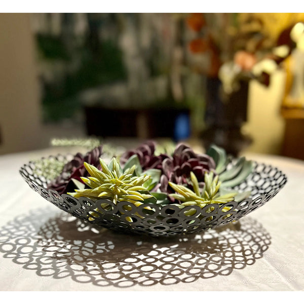 Recycled iron washer bowl styled as a decorative kitchen centrepiece