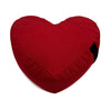 Red heart-shaped pillow on a white background