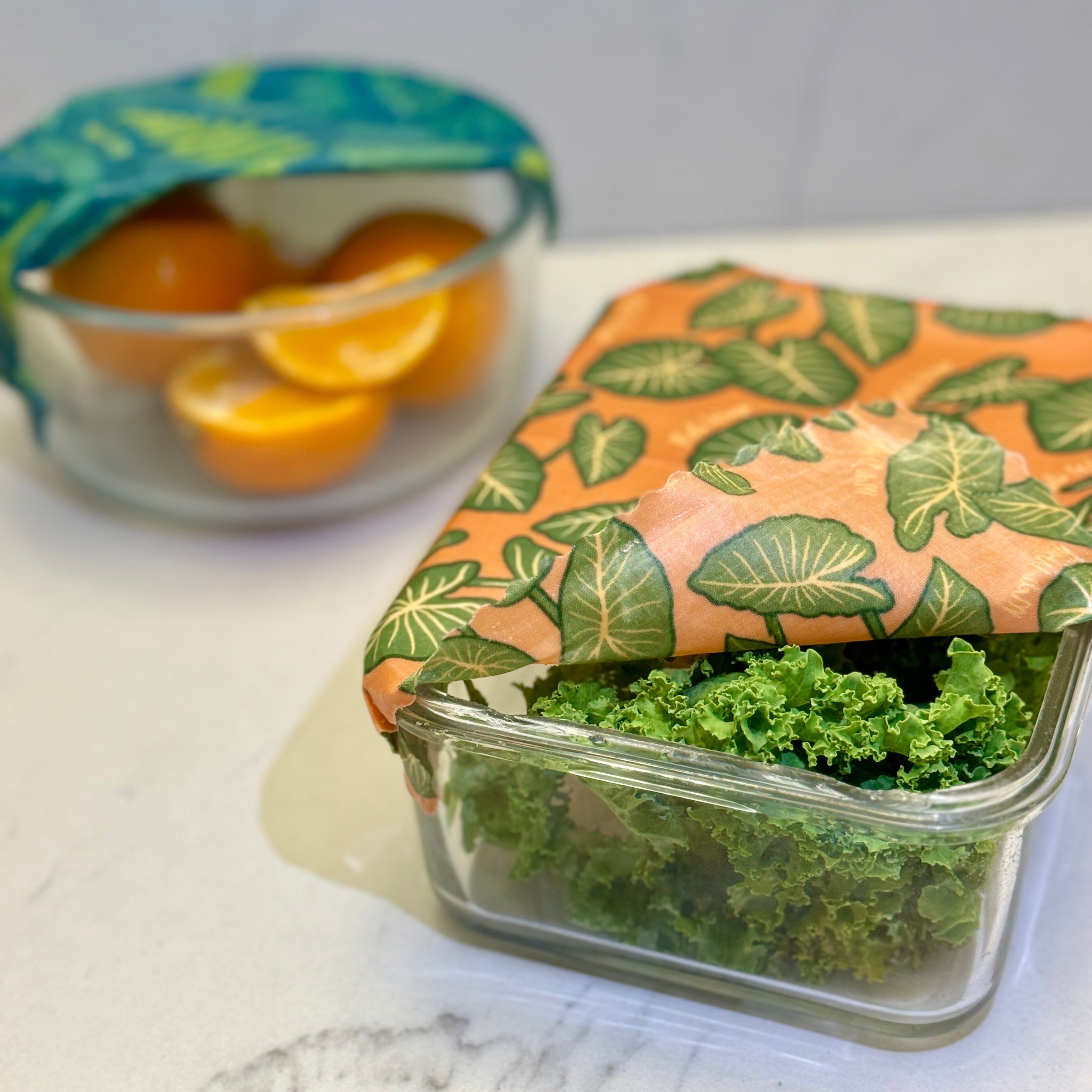 Meli Wraps Beeswax Food Wrap in Kalo Print covering a bowl