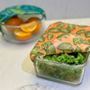 Meli Wraps Beeswax Food Wrap in Kalo Print covering a bowl