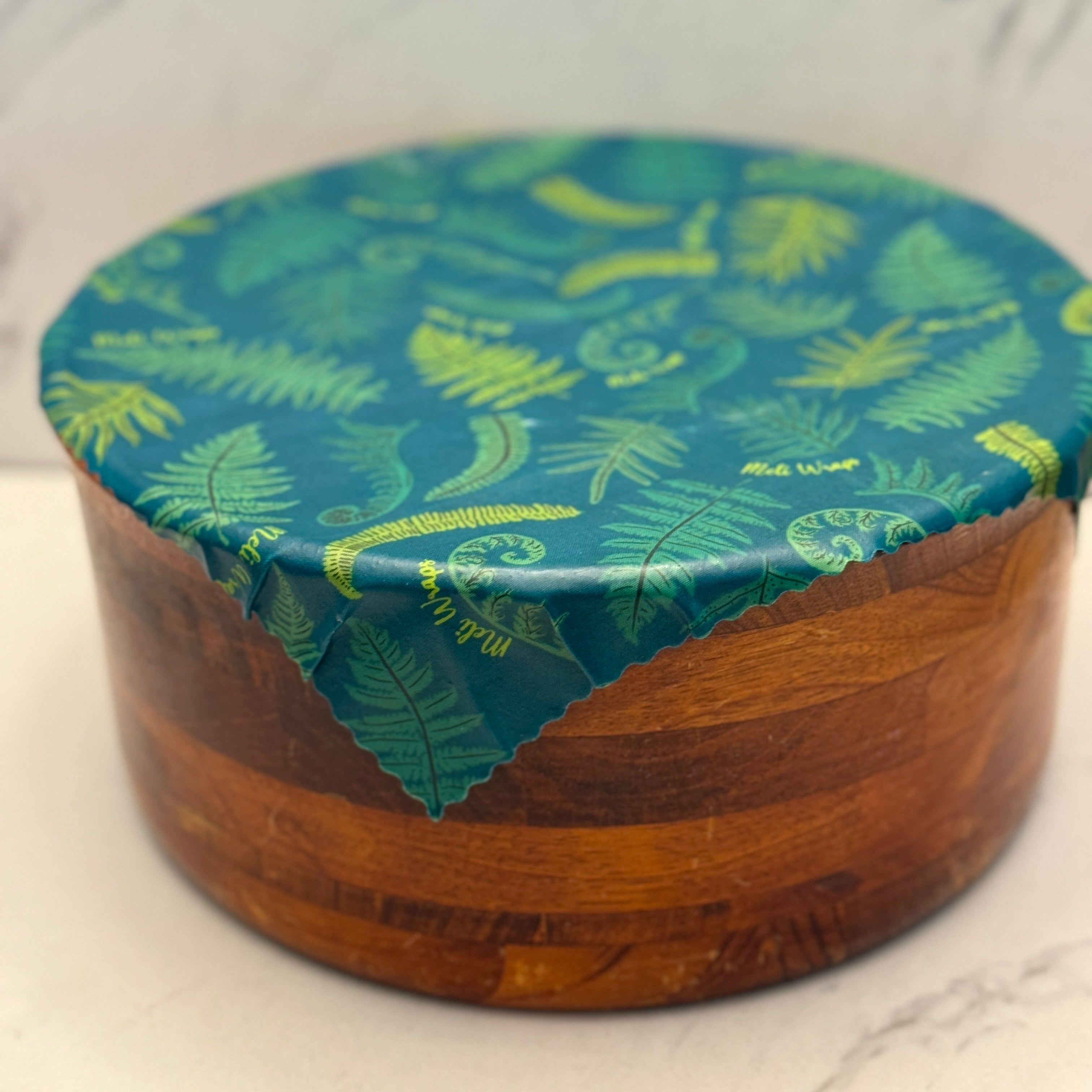 Fern print beeswax wrap bulk roll unrolled to show the full 13.5 x 42 inch length