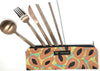 Meli Wraps Tropical Papaya reusable cutlery set laid out showing stainless steel fork, spoon, knife, chopsticks, reusable straw and straw cleaner