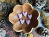 Set of five Anemone Purple felted wool hearts from House of Moss
