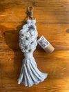Apotheke DuJardin lip balm holder styled on a vanity or desk