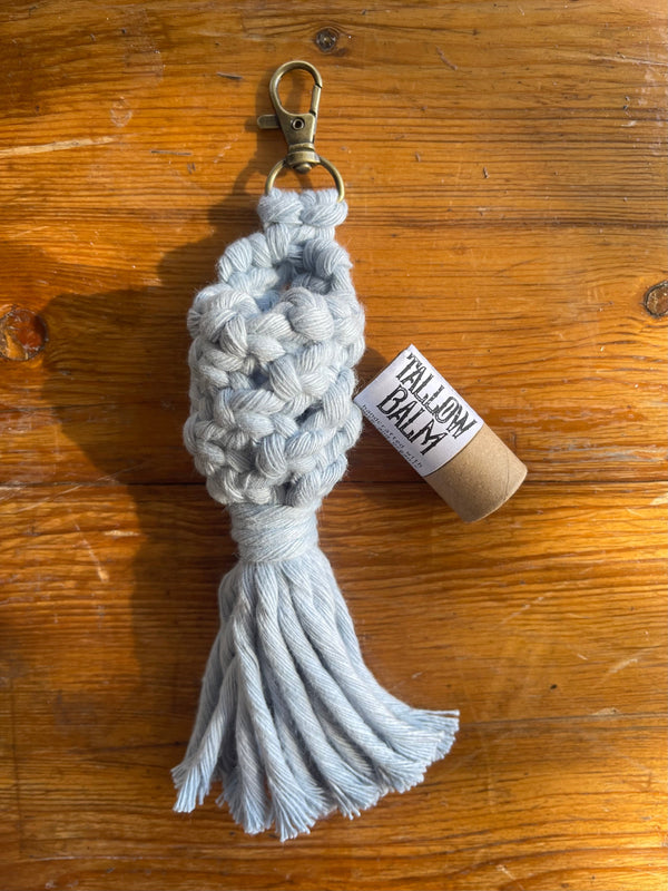 Apotheke DuJardin lip balm holder styled on a vanity or desk