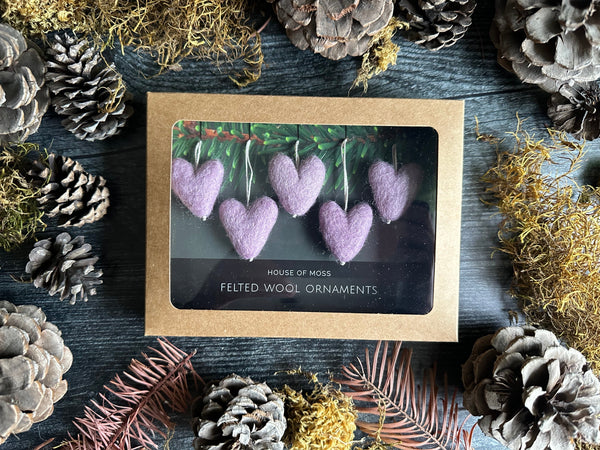 Handmade wool heart ornaments in Anemone Purple, about 1 inch across