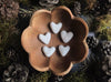 Set of five Snowberry White needle-felted wool hearts