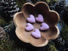Five small felted wool hearts in Mallow Pink, each about 1 inch across