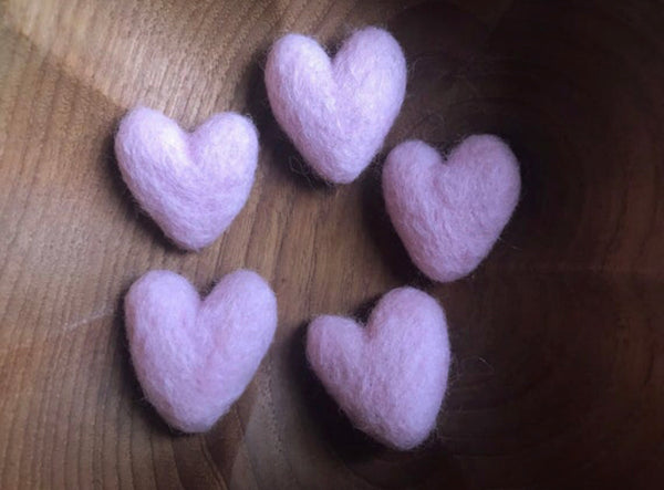 Mallow Pink felted wool hearts showing their organic, uneven shapes
