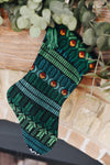 Add a touch of global elegance to your holiday decor with our handcrafted Guatemalan Brocade Christmas Stocking. Made from sustainable materials and featuring intricate patterns, this stocking is perfect for any home. Order yours today!