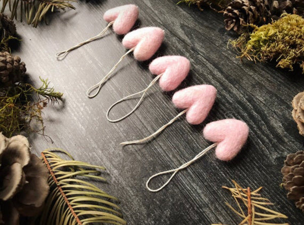 Handmade wool heart ornaments in Mallow Pink by House of Moss