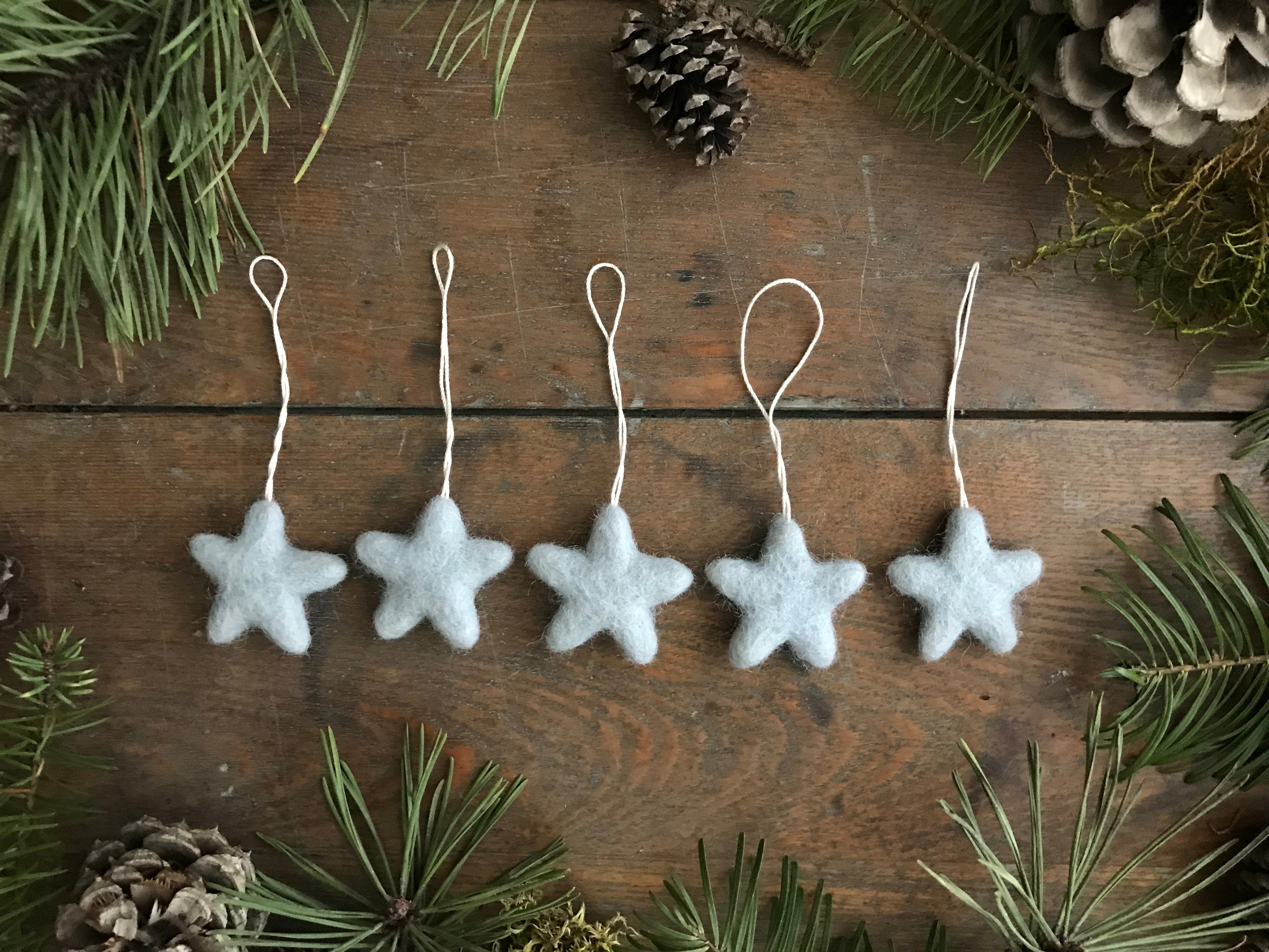 Set of five Morning Blue needle-felted wool star ornaments