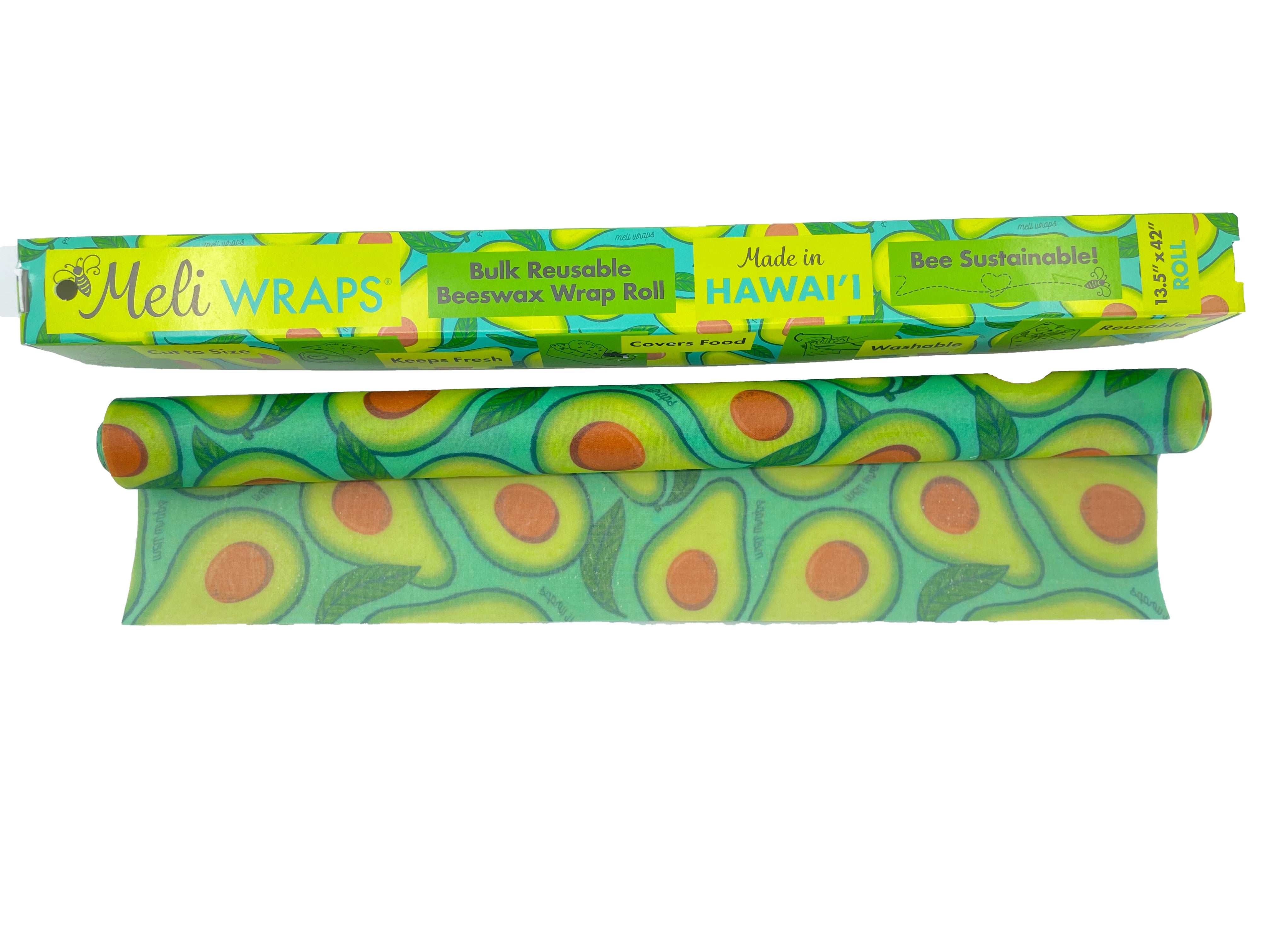 Meli Wraps beeswax wrap bulk roll with avocado print being cut to a custom size