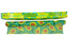 Meli Wraps beeswax wrap bulk roll with avocado print being cut to a custom size