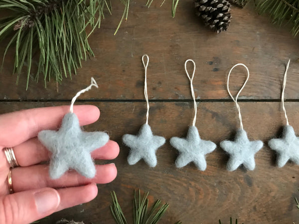 Morning Blue wool star ornaments with cotton string hanging loops