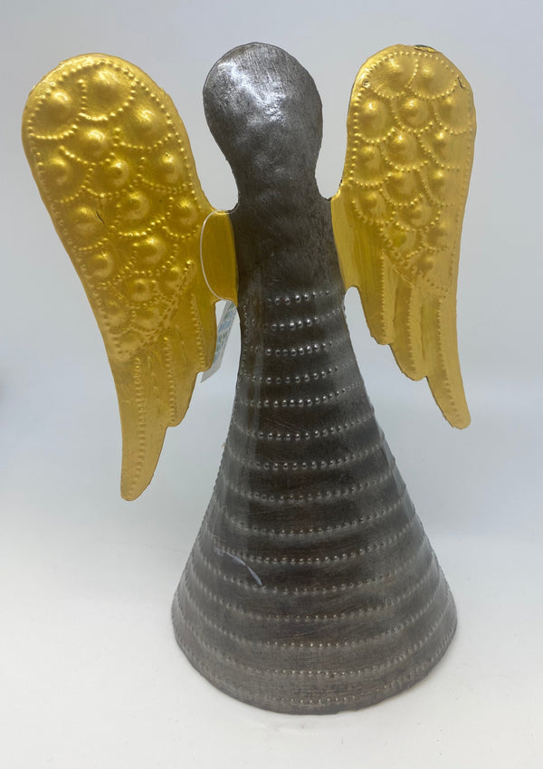 Hand-hammered metal angel tree topper made from recycled oil drums by fair-trade artisans in Haiti, usable as a tree topper or table ornament