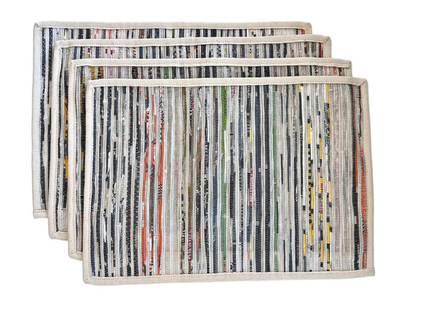 Set of 4 reversible upcycled plastic placemats laid flat showing woven texture and colour variation