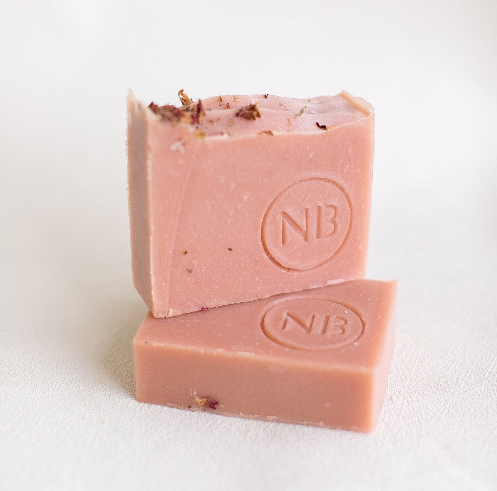 Rose Clay Soap Bar - Gently exfoliate & glow. Invigorating citrus & floral scent, spa-like experience. Natural, vegan, handcrafted. Shop now!