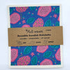 Dragonfruit Swedish Dish Cloth Set of 3 laid out on a kitchen counter