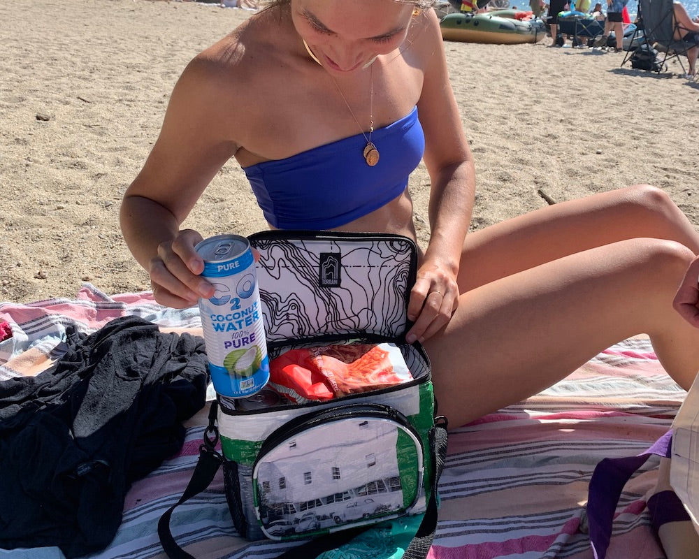 Stay cool and sustainable with our Plunge Cooler Bag. This reusable cooler is made from recycled materials and is perfect for keeping your drinks and snacks chilled on hot days. Lightweight, durable, and eco-friendly, the Plunge Cooler Bag is the perfect companion for your outdoor adventures. Order yours today!