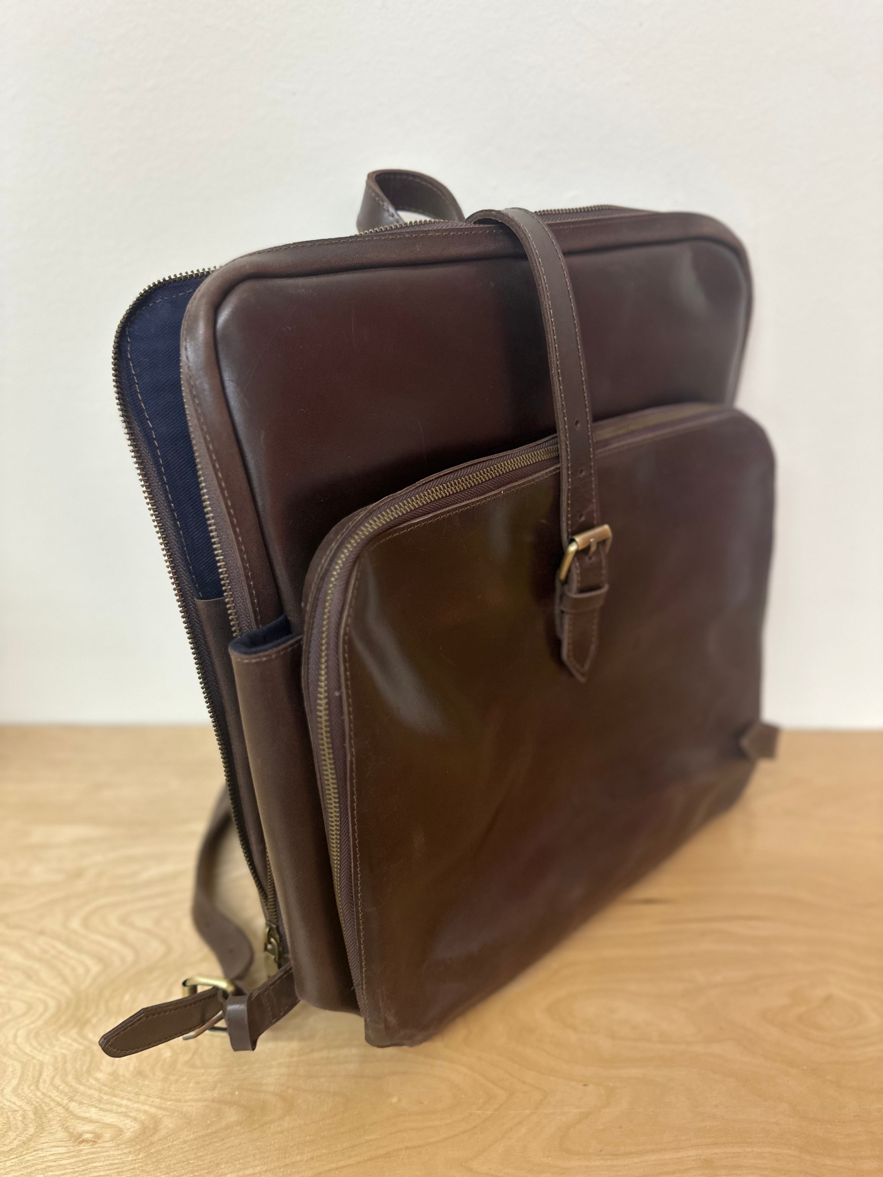 Close-up detail of the Voyager leather backpack showing craftsmanship and stitching – Fair Anita