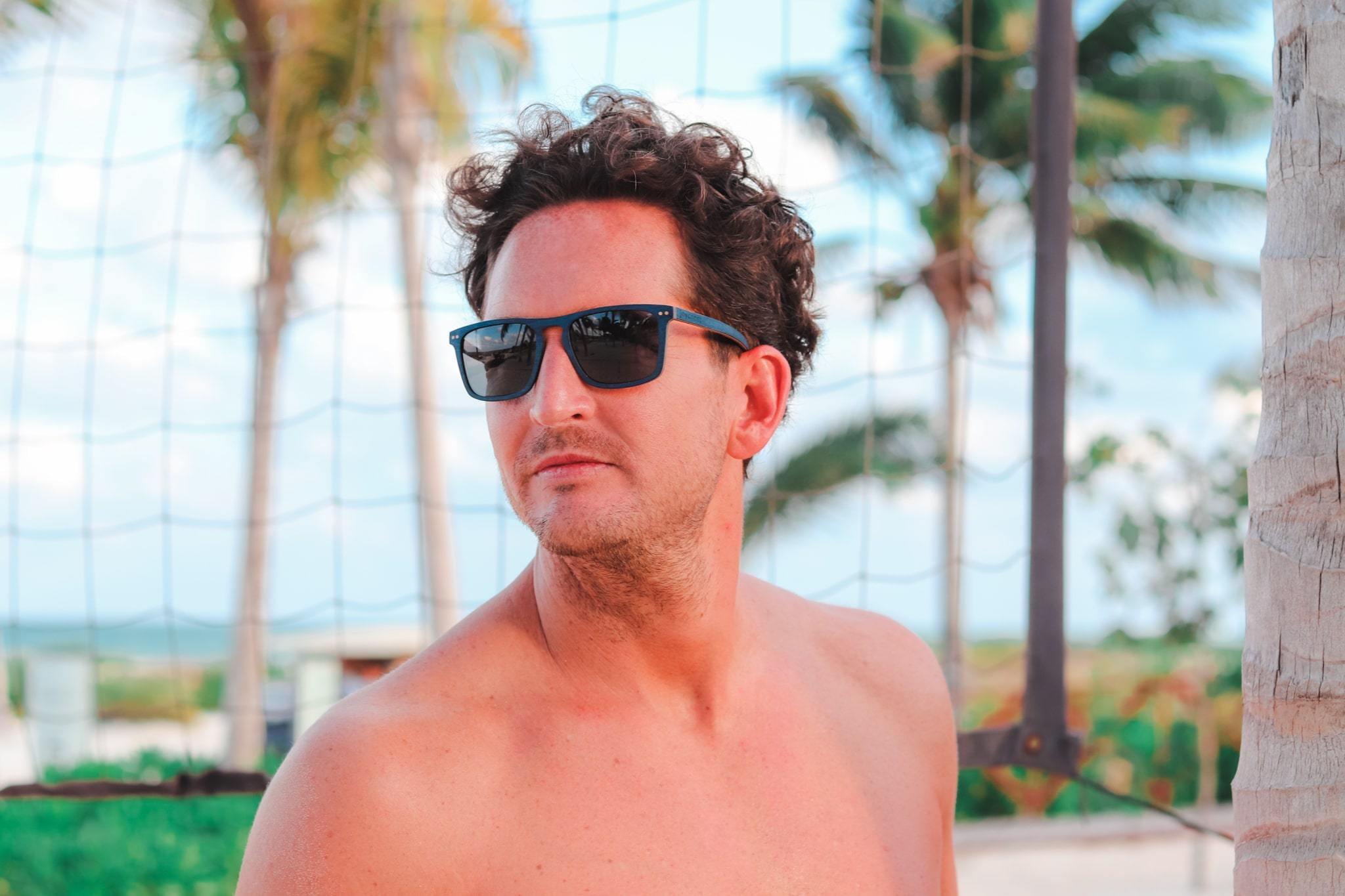 Close-up of Blu Wayfinder maple wood sunglasses arm and hinge detail