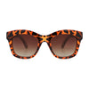 Sunglasses with orange and black pattern on a white background