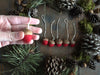 Amanita Red needle-felted acorn ornaments set in natural acorn caps