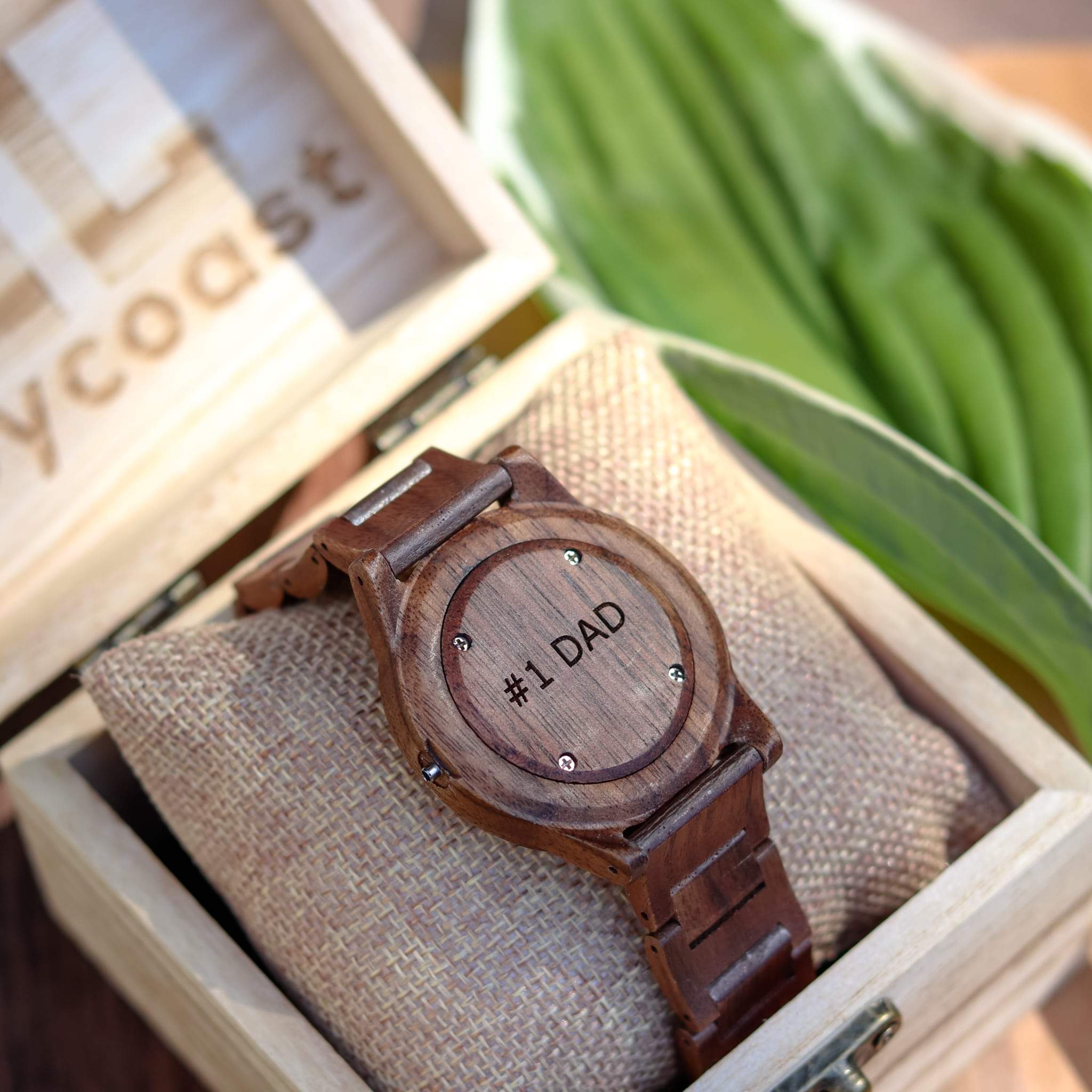 Wooden watch with '#1 DAD' engraving in a box
