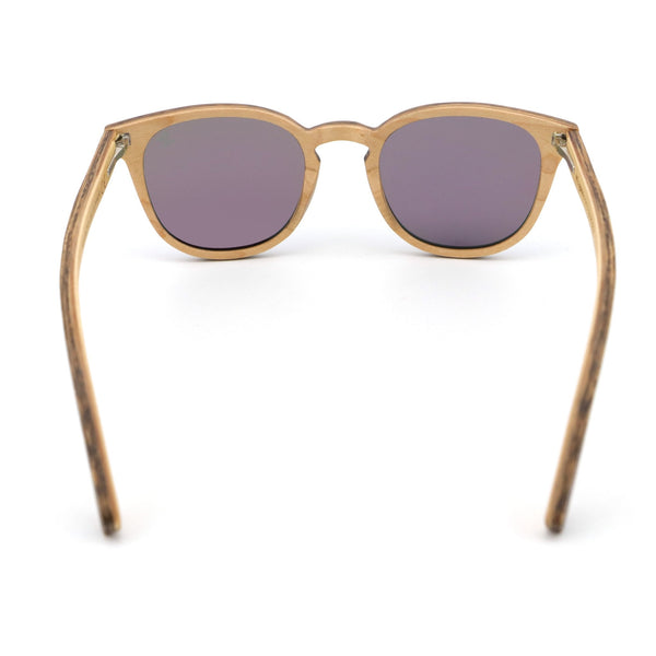 Wooden-framed sunglasses with purple lenses on a white background