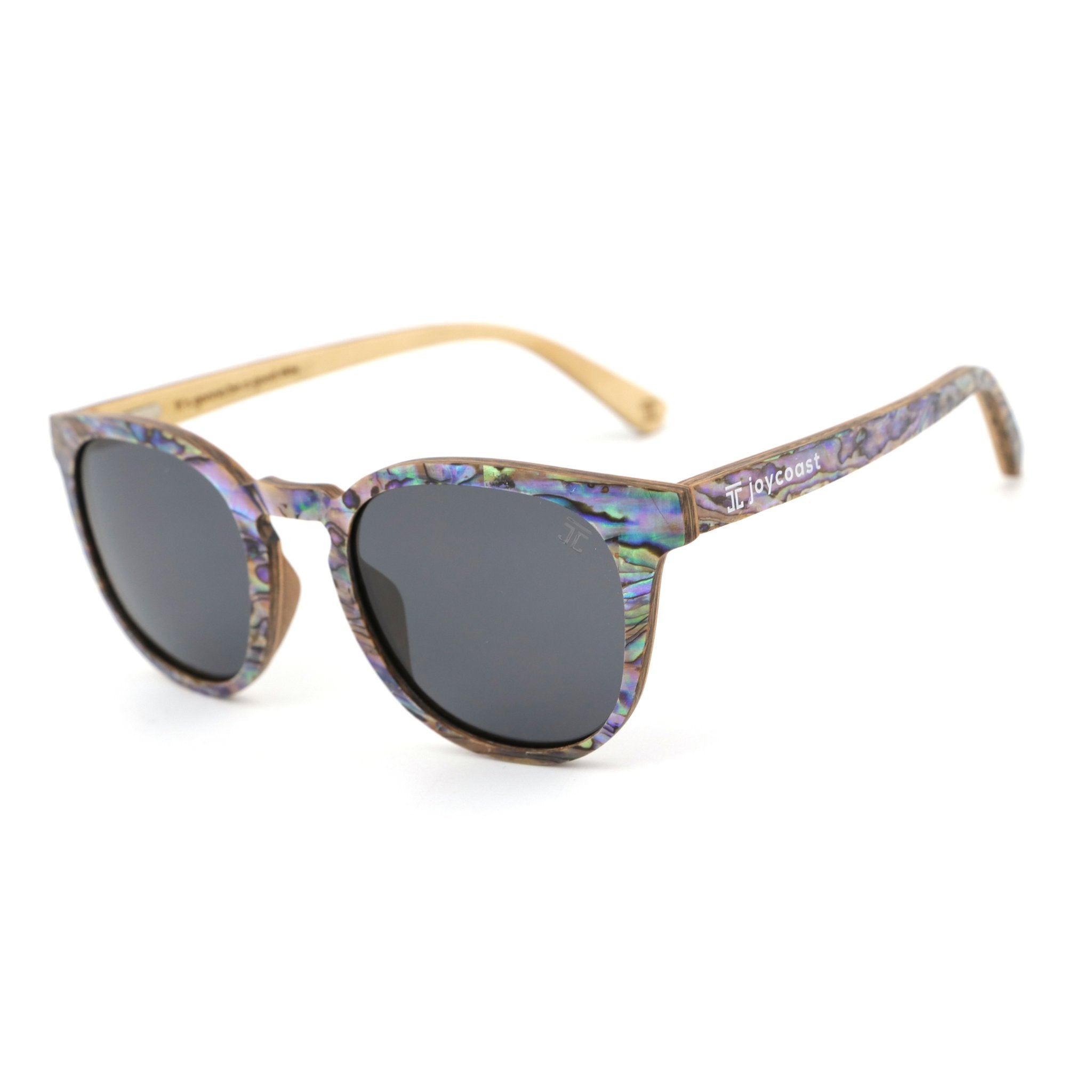 Sunglasses with floral patterned arms on a white background