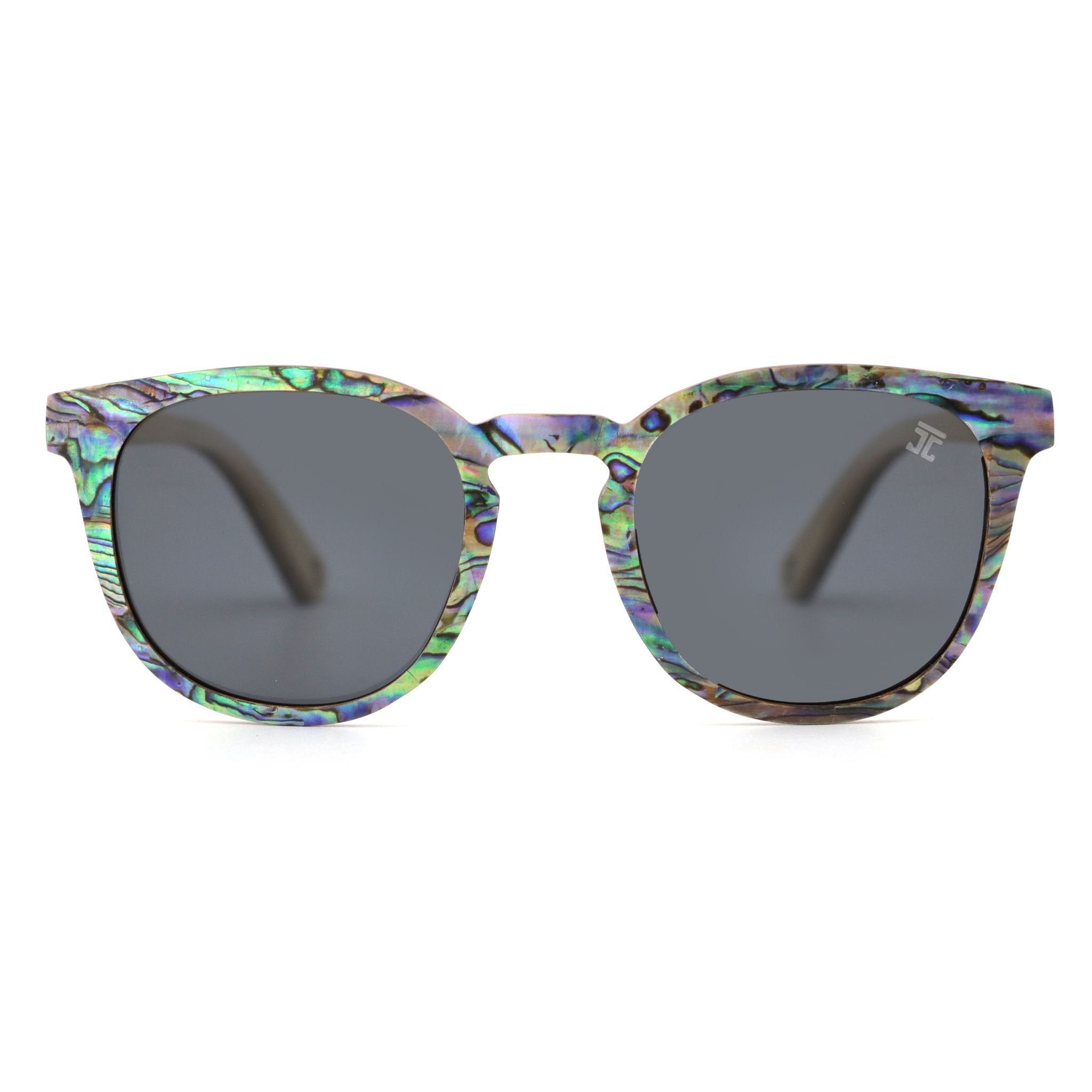 Sunglasses with colorful frame and dark lenses on a white background