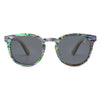 Sunglasses with colorful frame and dark lenses on a white background