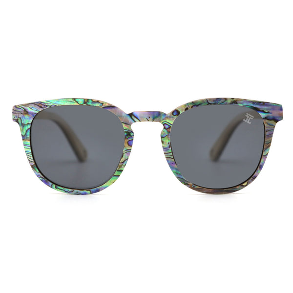 Sunglasses with colorful frame and dark lenses on a white background