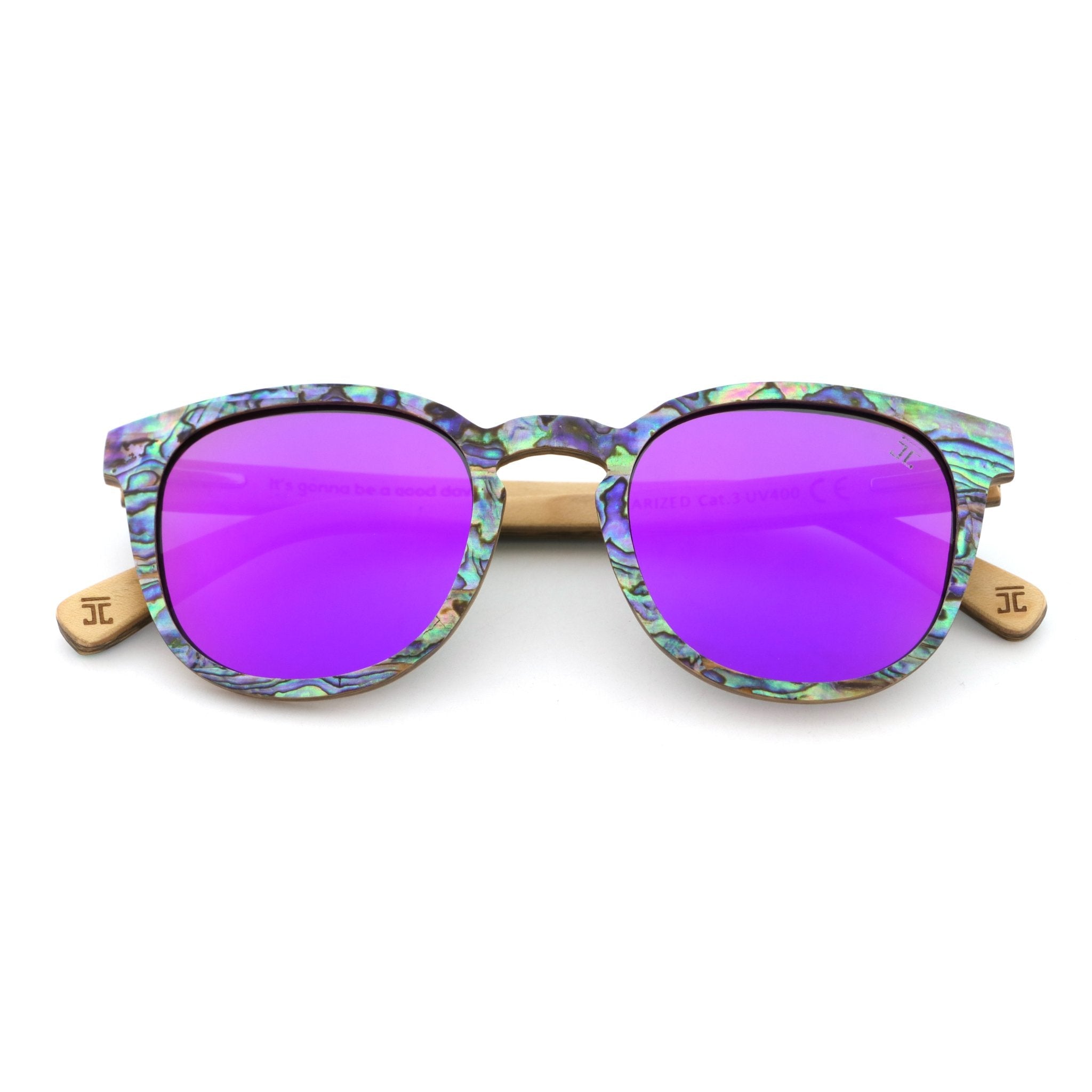 Sunglasses with purple lenses and colorful frame on a white background