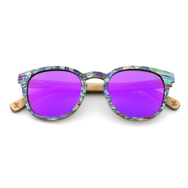 Sunglasses with purple lenses and colorful frame on a white background