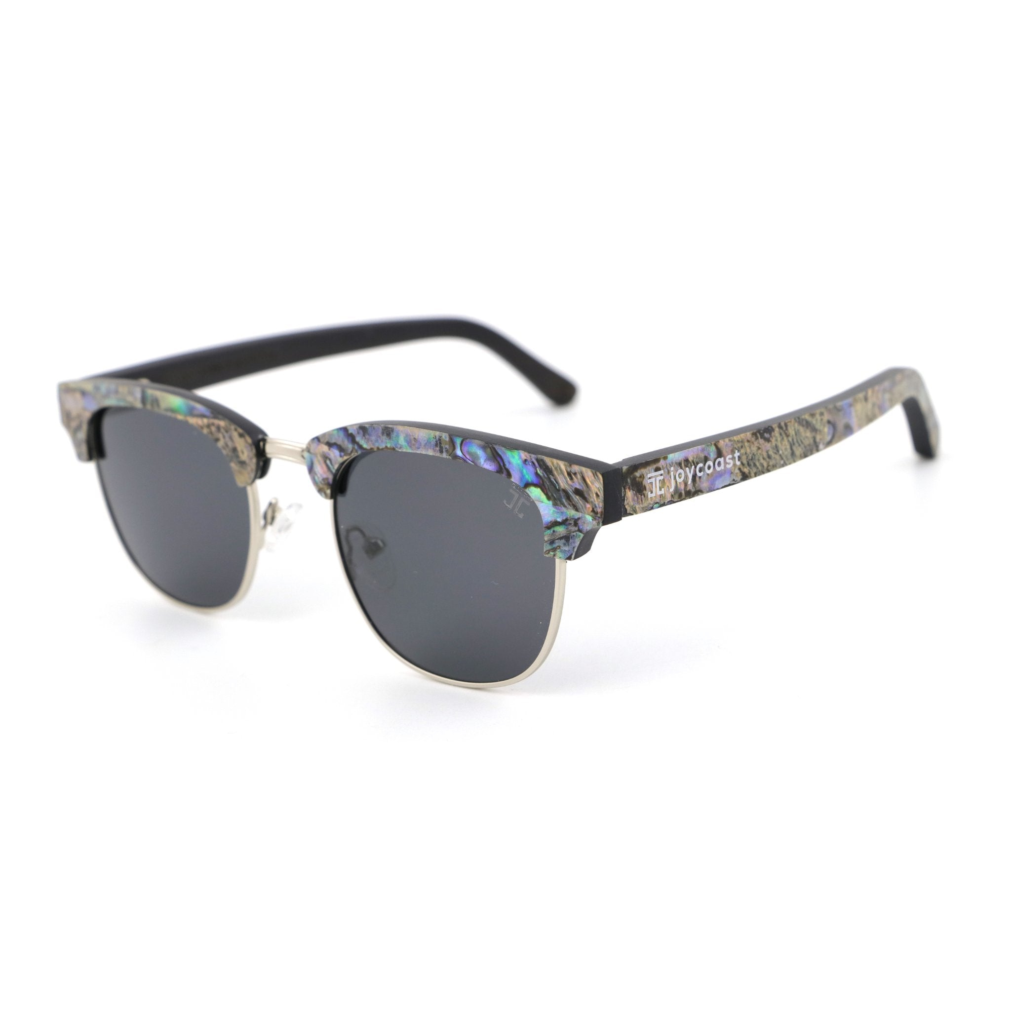 Close-up of abalone shell detailing on Malcolm 2 eco-friendly wooden sunglasses
